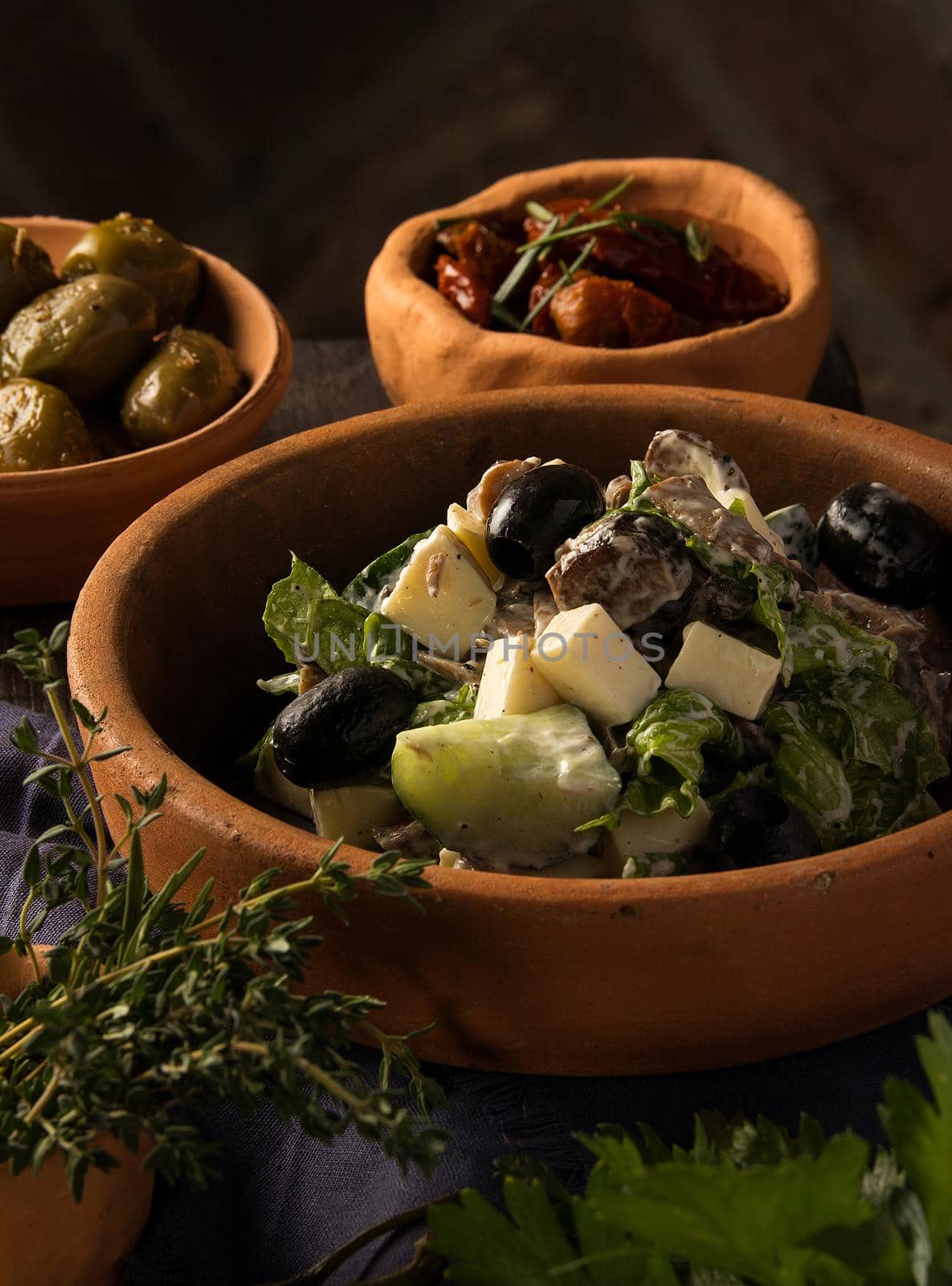 A closeup shot of a gourmet Georgian salad on a restaurant table