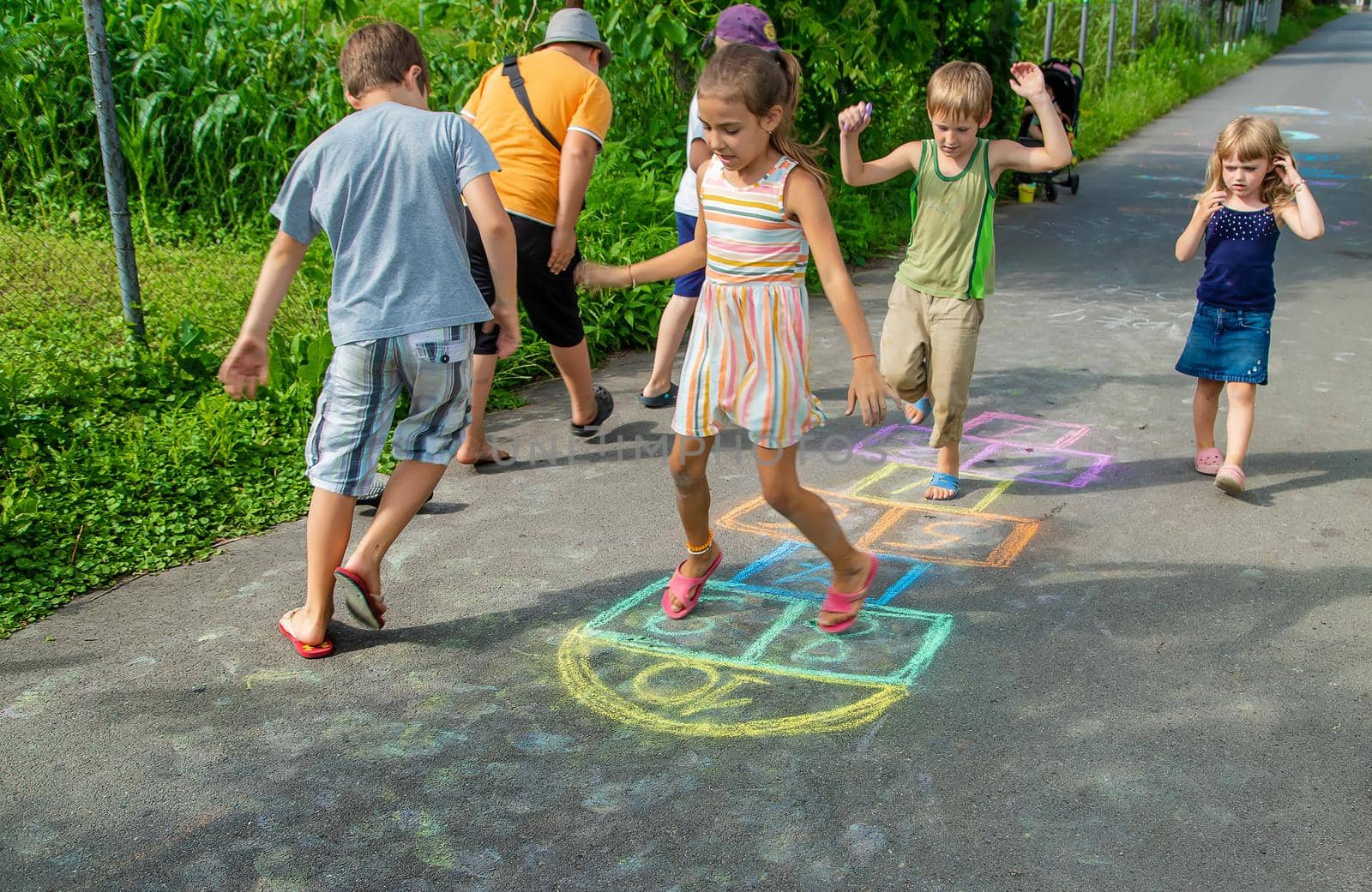 Children play classics on the street. Selective focus. Kids.