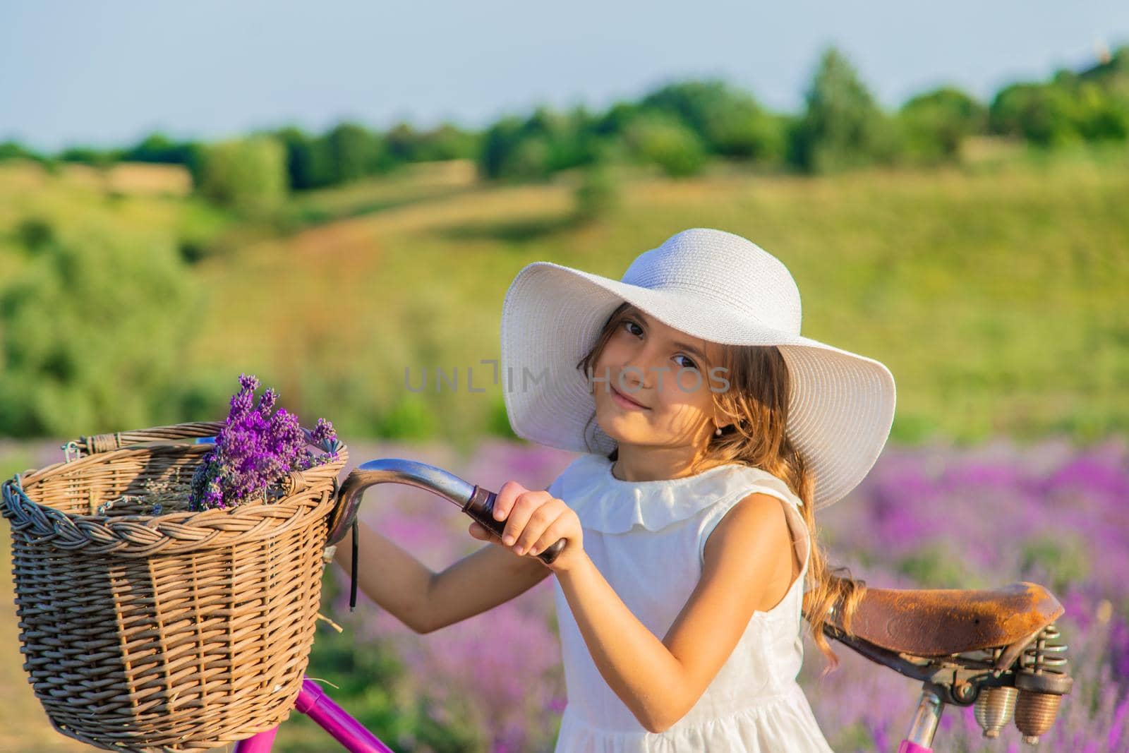 A child in a lavender field. Selective focus. Nature.