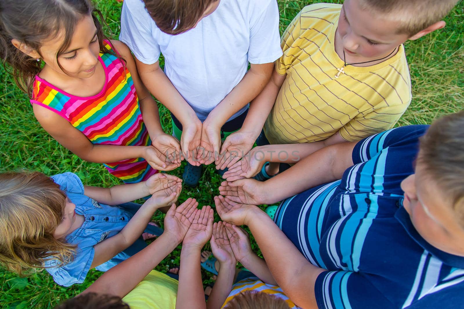 Children's friendship, children's hands on the street. Selective focus. by yanadjana