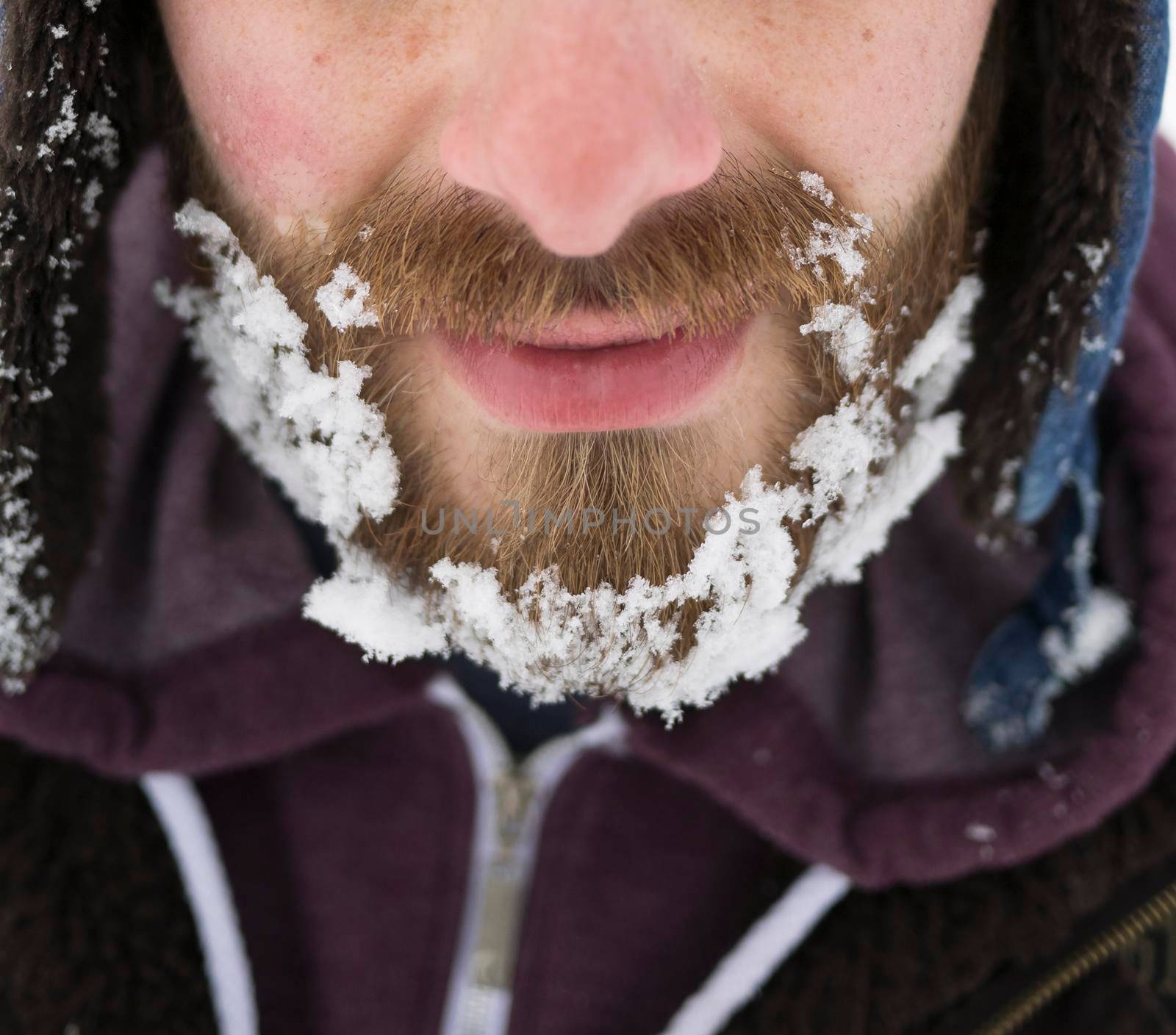 Frozen snow on the beard.