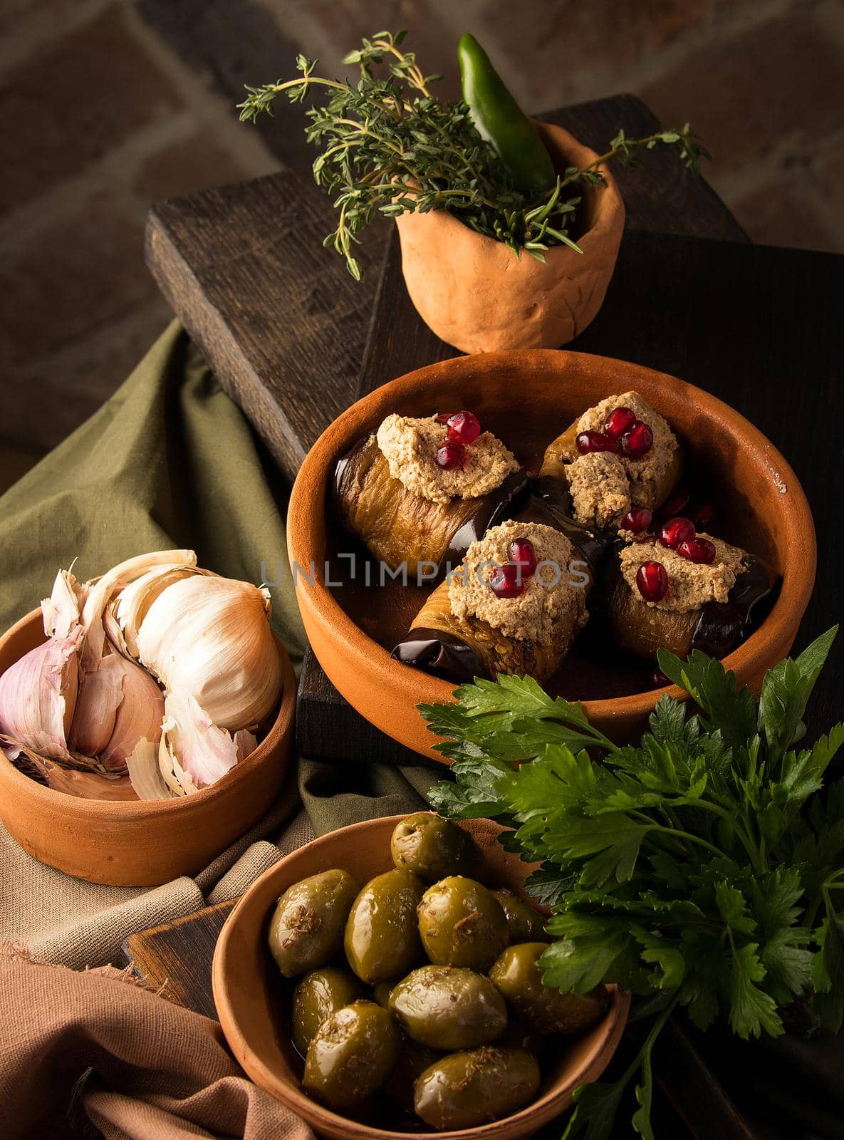 A vertical shot of eggplant rolls