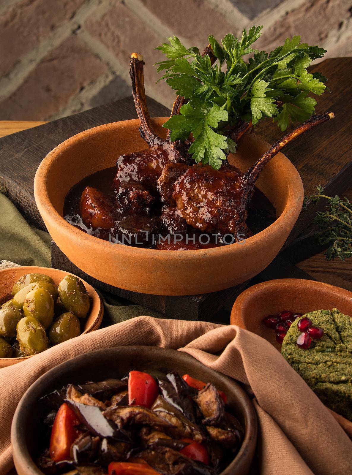 Vertical shot of a tomahawk steak and appetizers by A_Karim