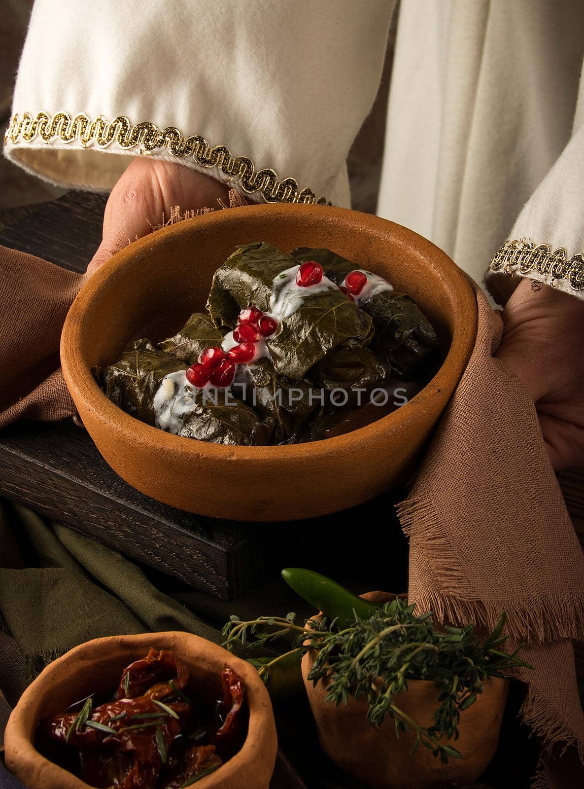 Close up shot of a dolma covered in grape leaves by A_Karim