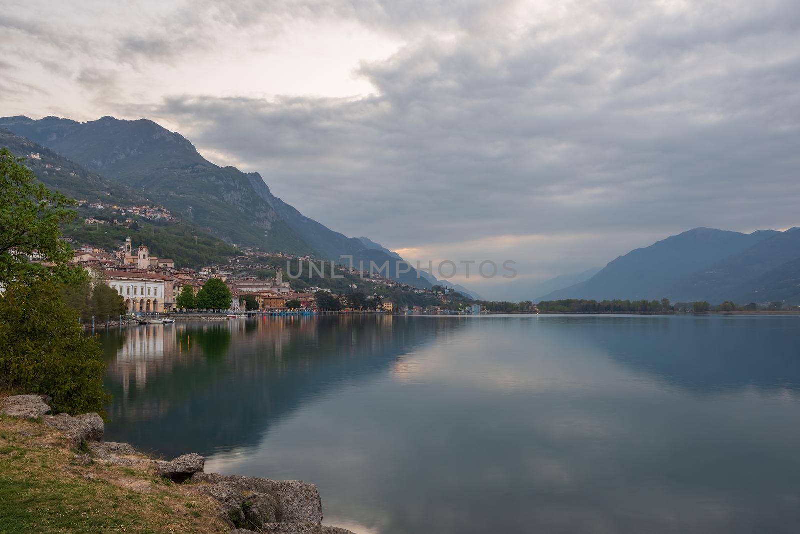 Nice view of Lake Iseo at morning, on the left the city of lovere which runs along the lake,Bergamo Italy.