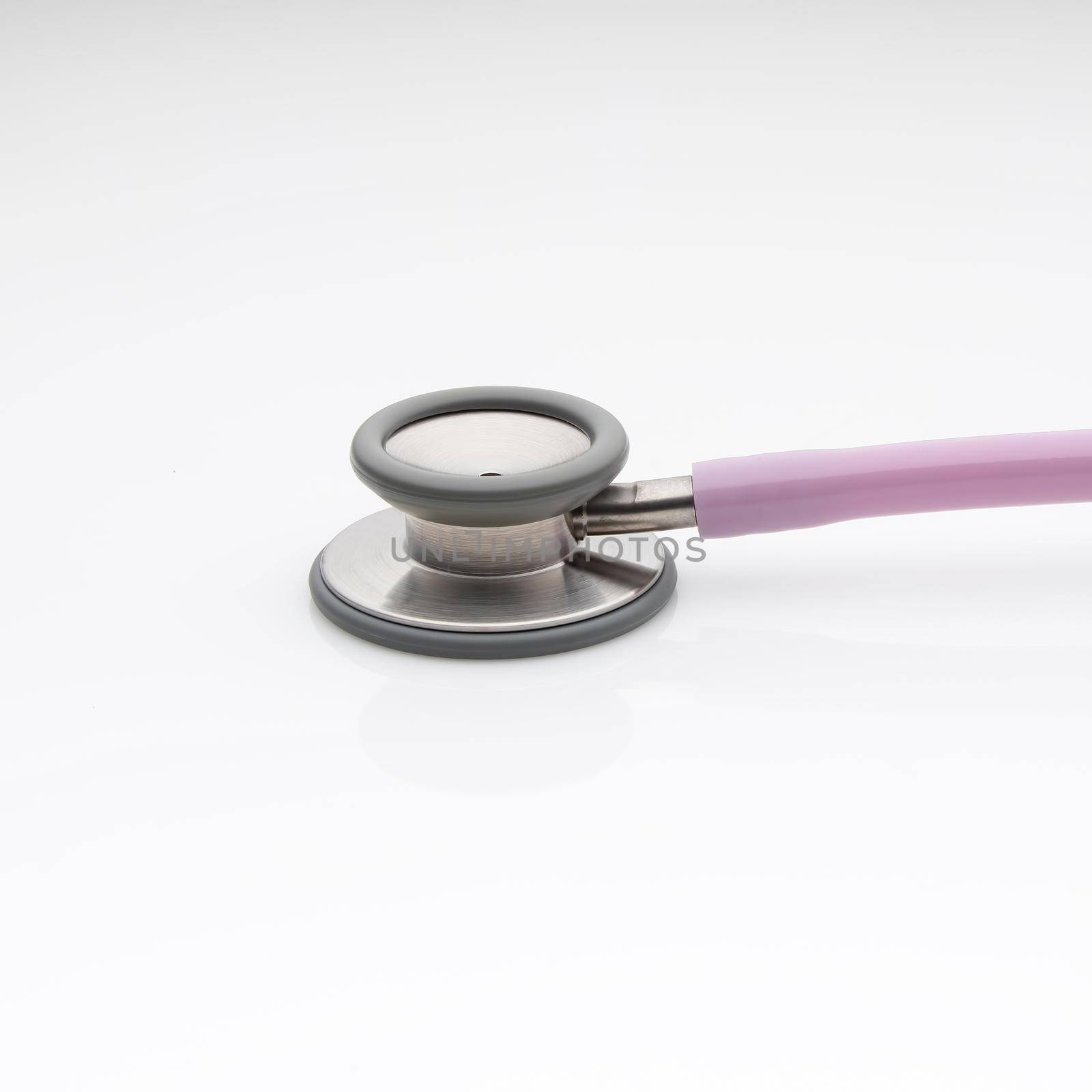 Diaphragm of medical stethoscope isolated on a white background by A_Karim