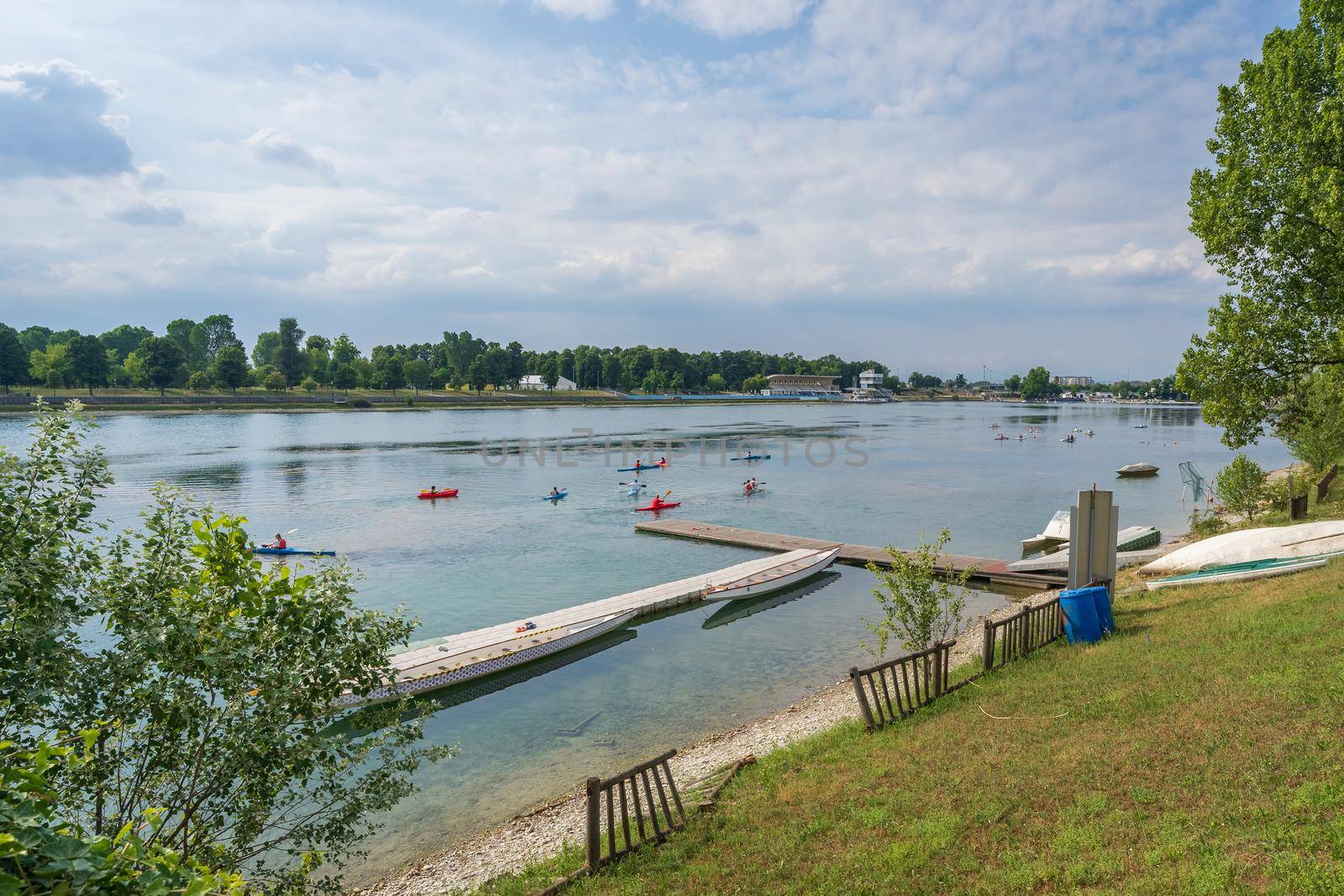 Canoes at the Idroscalo Park in Milan at overcast summer day