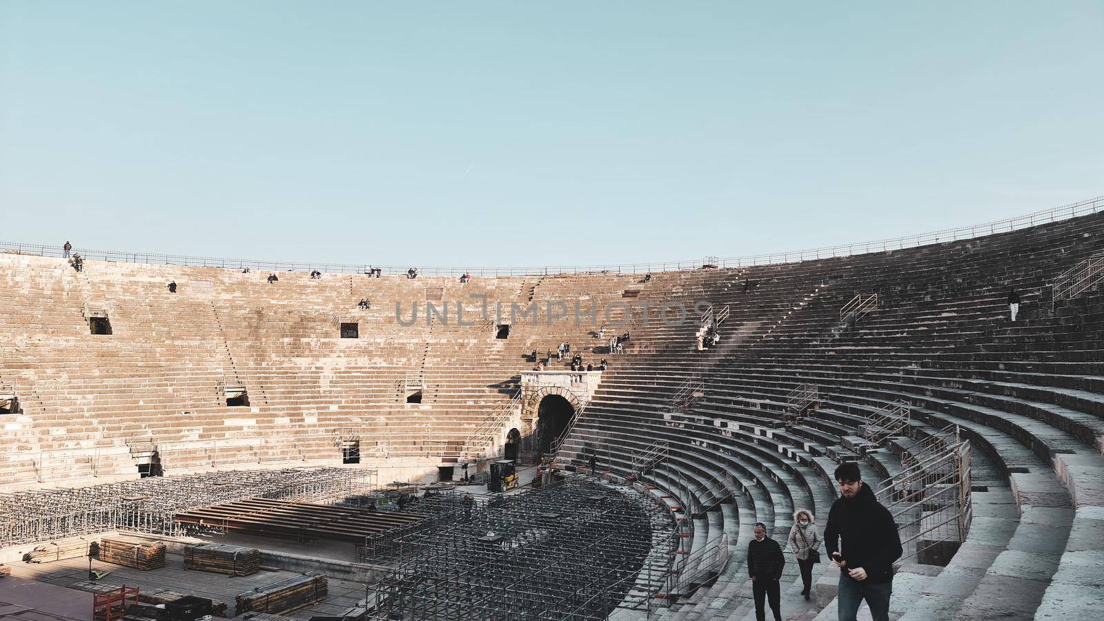 Verona, Italy - March 19, 2022: Beautiful photography of the Arena at Piazza Brà in Verona, a famous Roman amphitheater. Macro view of the old construction by day.