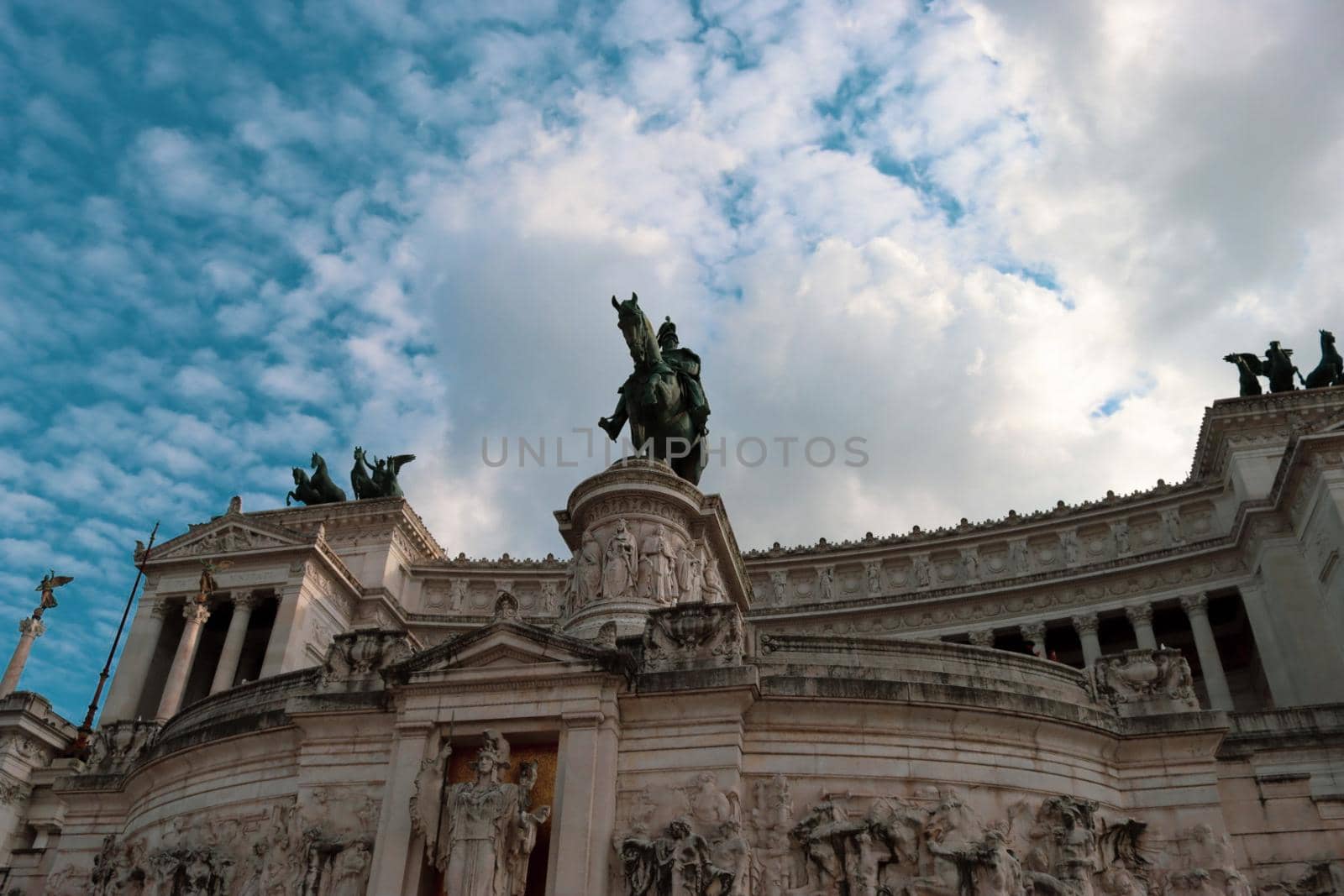 ROME, ITALY - February 05, 2022: Panoramic view of inside part of Colosseum in city of Rome, Italy. Cold and gray sky in the background. Macro photography of the arches.