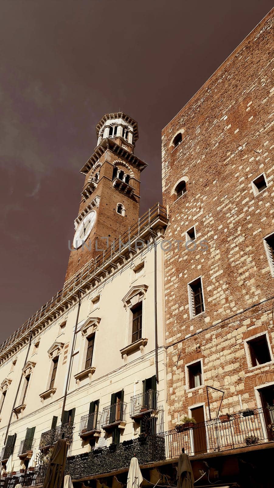 Verona, Italy - March 19, 2022: Beautiful photography of the Arena at Piazza Brà in Verona, a famous Roman amphitheater. Macro view of the old construction by day.