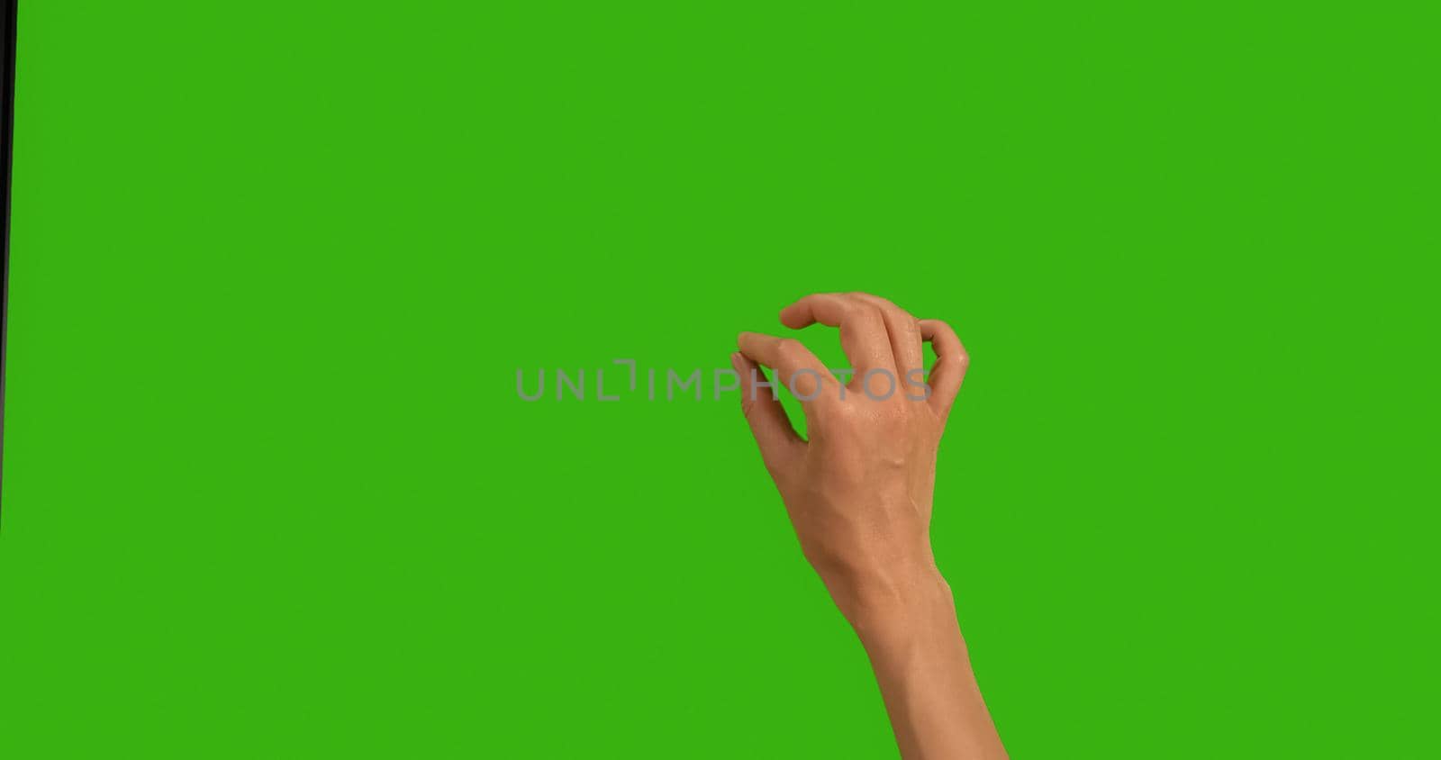 Close Up Hand Touching, Clicking, Tapping, Swiping on Chroma Key Green Background, like using a Smartphone, Tablet Pc or a Touchscreen. Hand gestures. Zoom,