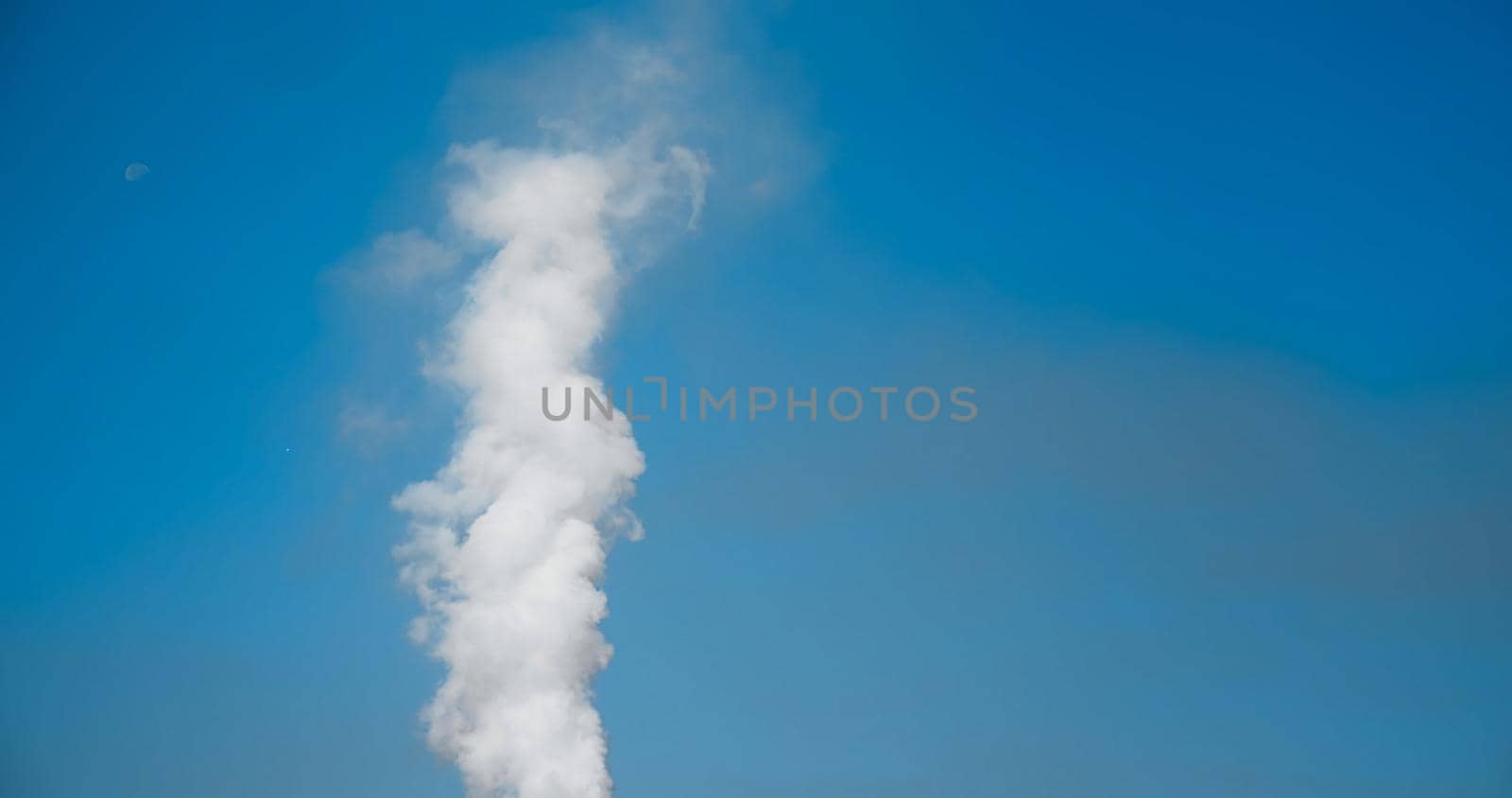 Smoke details on blue sky background. by RecCameraStock