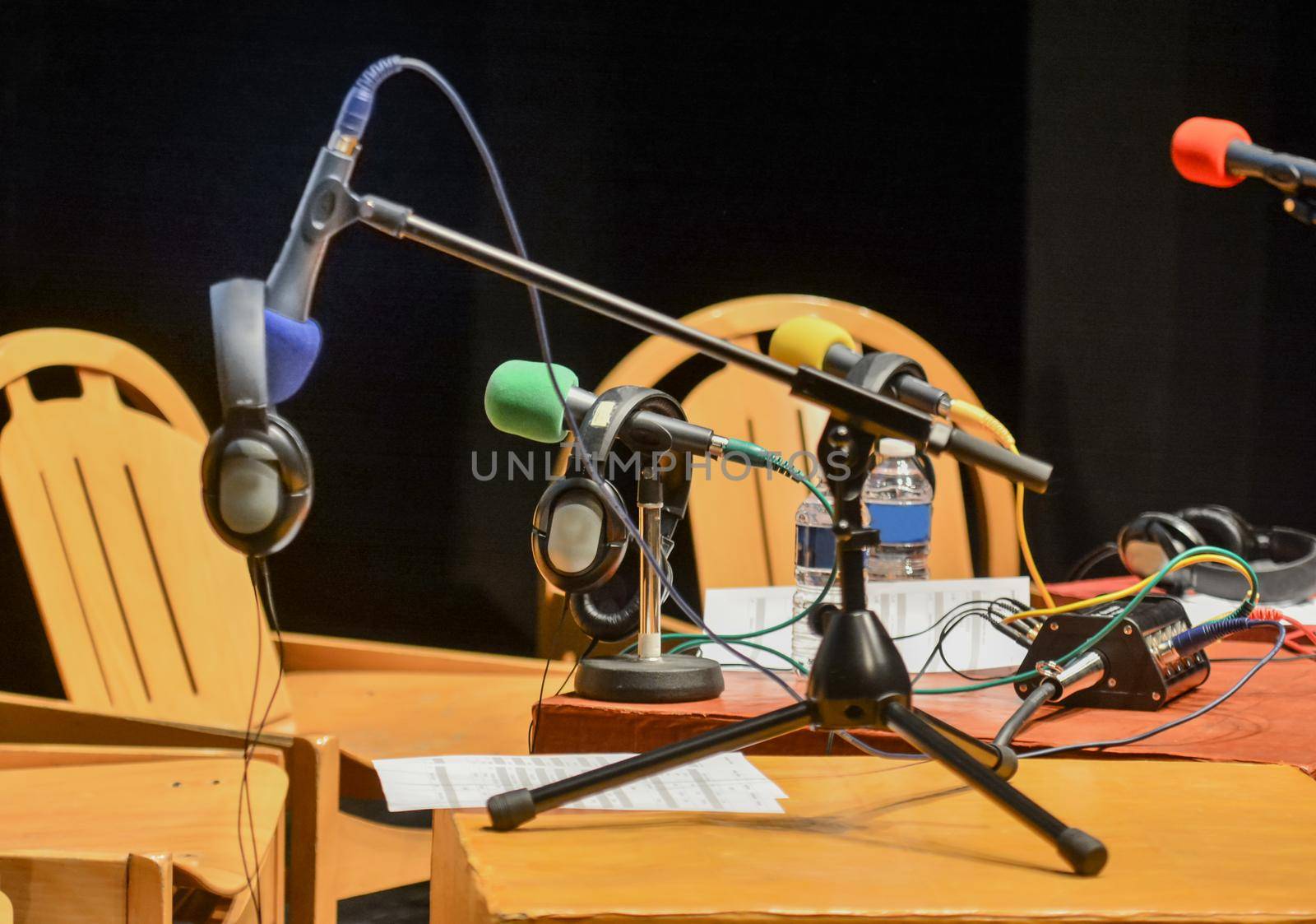 Microphones and headphones are prepared for interviews