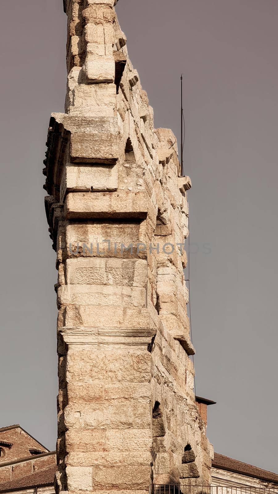 Verona, Italy - March 19, 2022: Beautiful photography of the Arena at Piazza Brà in Verona, a famous Roman amphitheater. Macro view of the old construction by day.