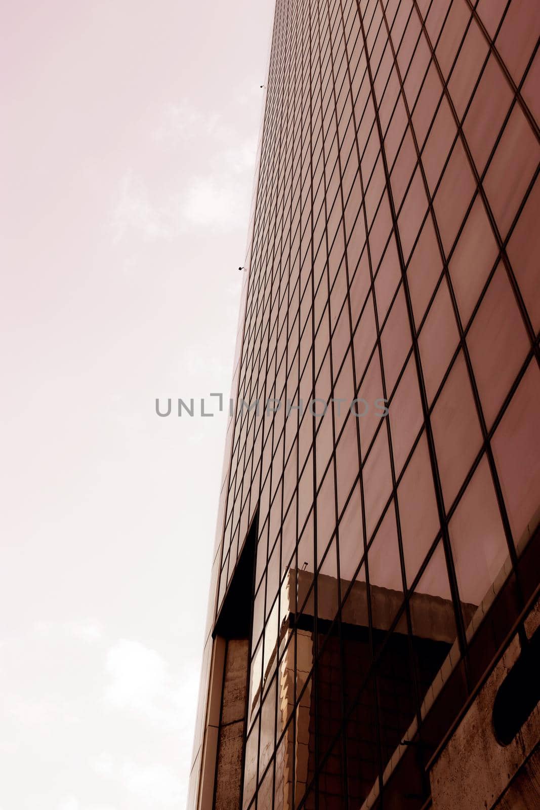 Genova, Italy-January 29, 2022: Beautiful modern high-rise buildings against the sky. 3d illustration on the theme of business success and technology. clouds reflection on the mirror.Industrial zone.