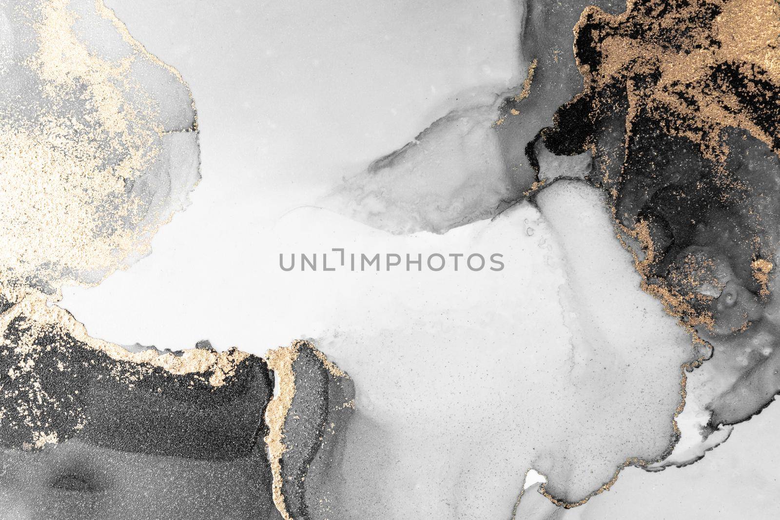 Black gold abstract background of marble liquid ink art painting on paper . Image of original artwork watercolor alcohol ink paint on high quality paper texture .