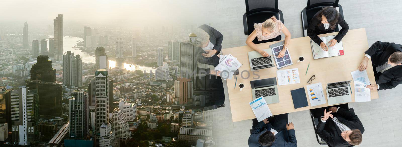 Business people group meeting shot from top widen view in office . Profession businesswomen, businessmen and office workers working in team conference with project planning document on meeting table .