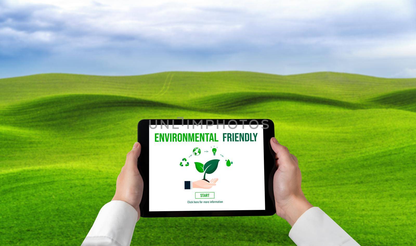 Green business transformation for environment saving and ESG business concept. Businessman using tablet to set corporate goal toward environmental friendly management and alternative clean energy use.