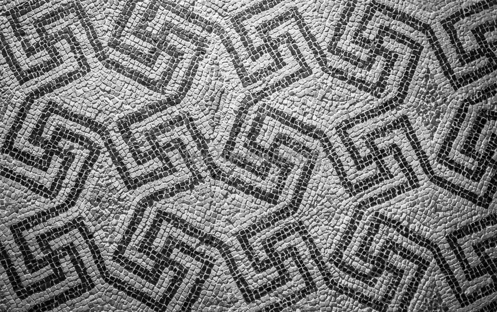 Swastika symbol in ancient Celtic mosaic decoration. Design for an old style background.