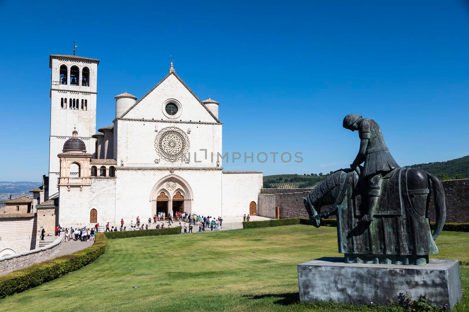 Assisi village in Umbria region, Italy - circa June 2021: the most important Italian St. Francis Basilica (Basilica di San Francesco)