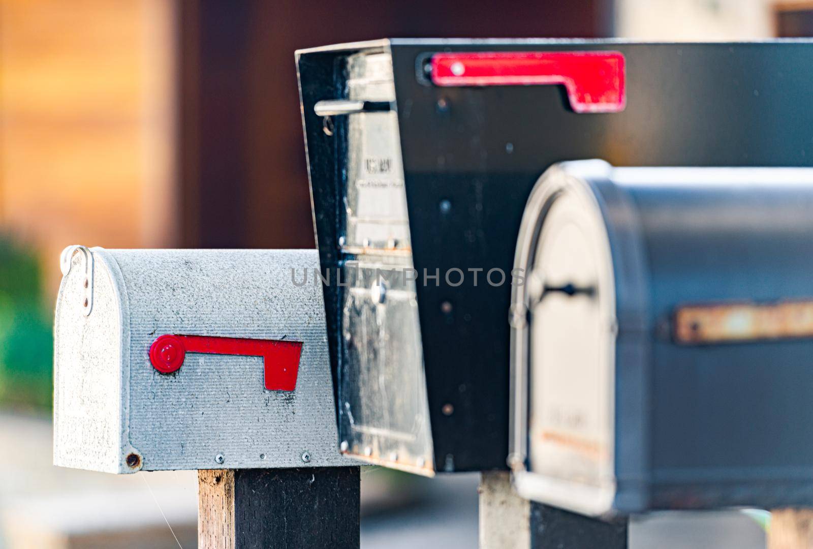 Old USA metal mailboxes in city by Yolshin