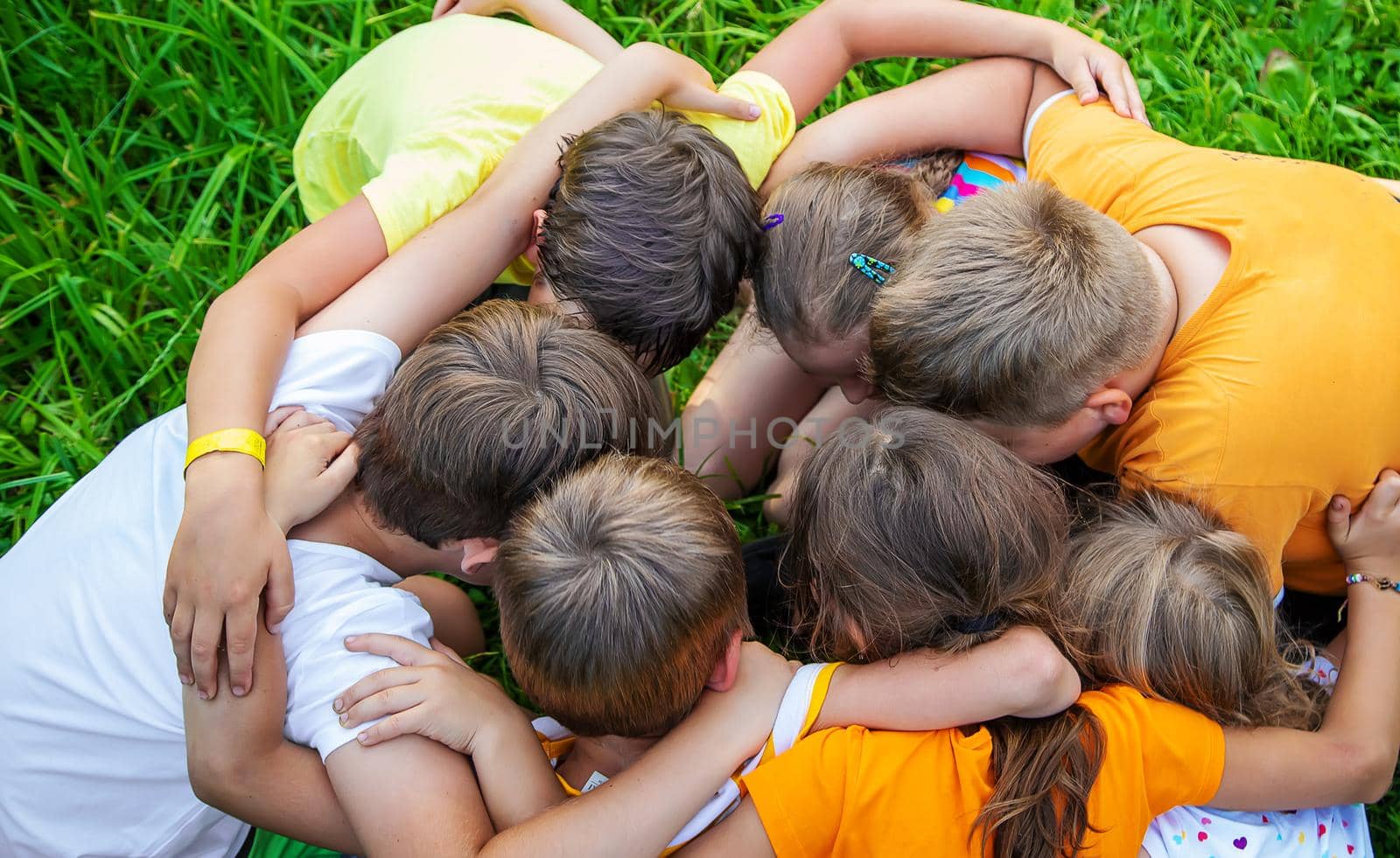 Children are playing with their hands clasped together. Selective focus. Kids.