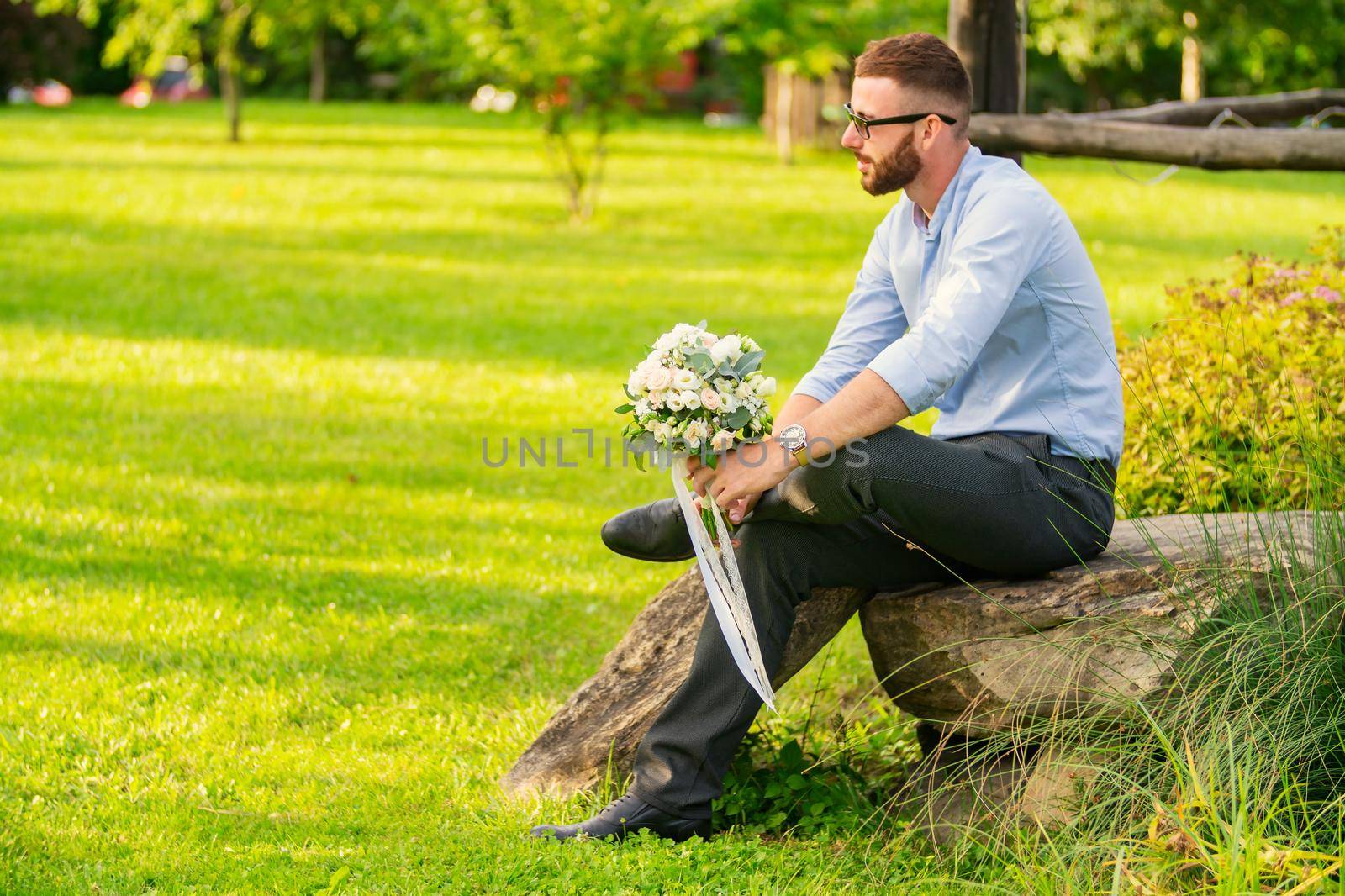 guy with a wedding bouquet by zokov