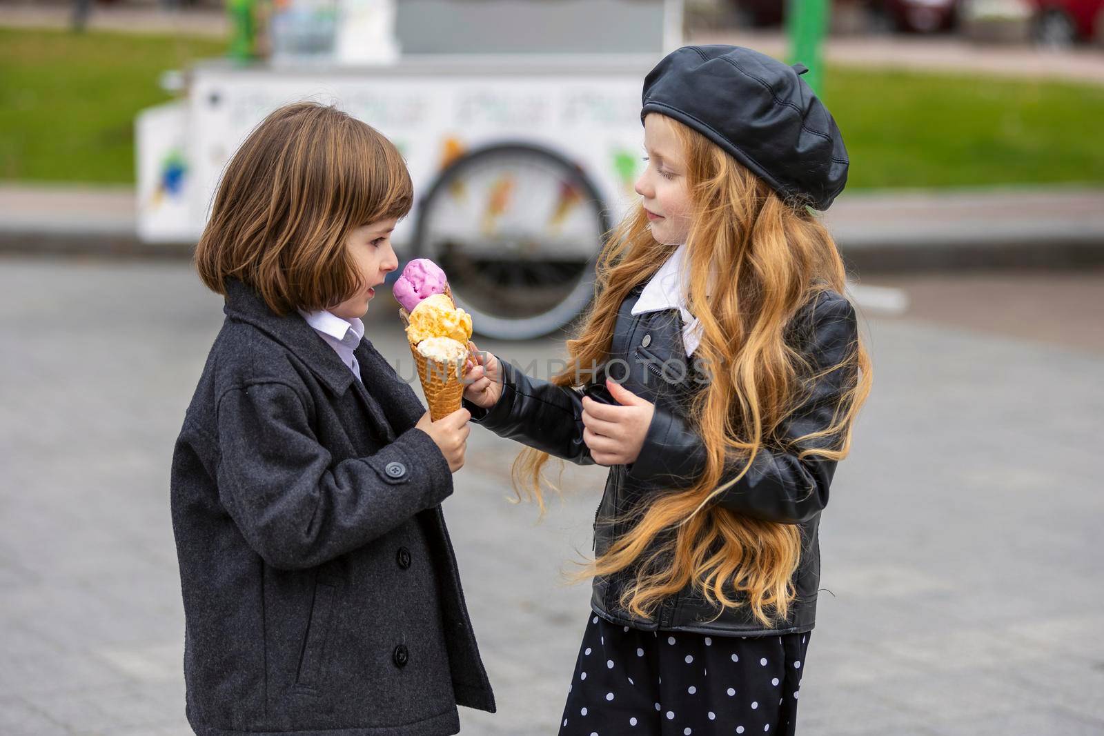 Children eating ice cream by zokov