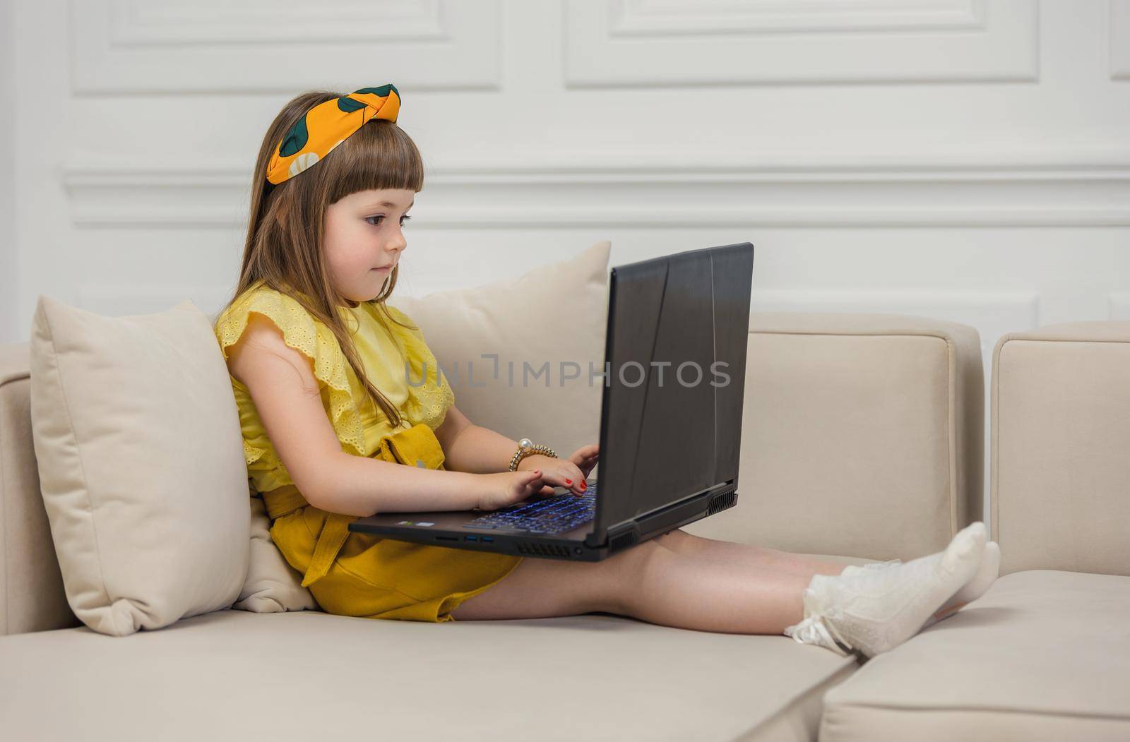 girl sitting with laptop by zokov