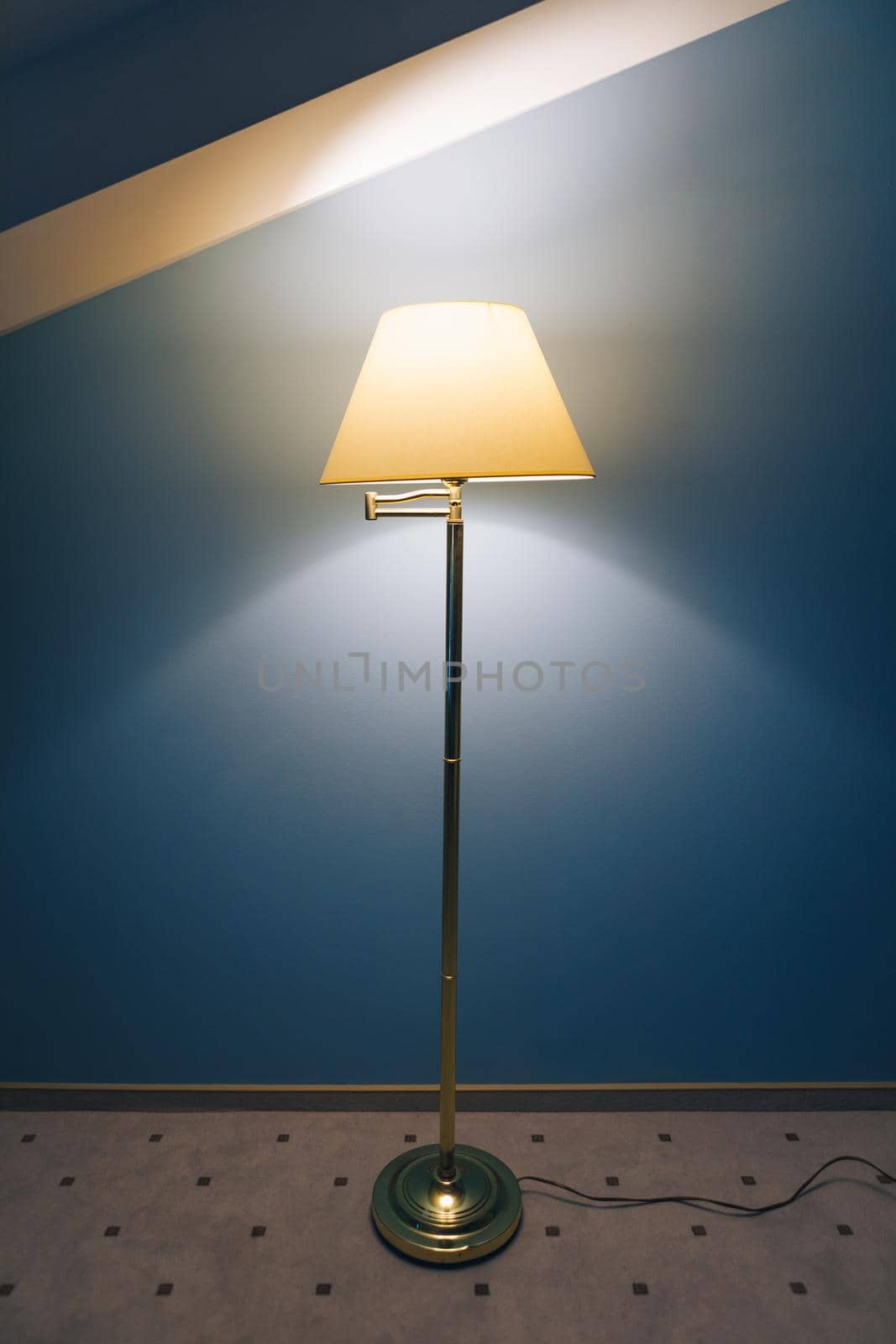 lamp light on blue background with copy-space