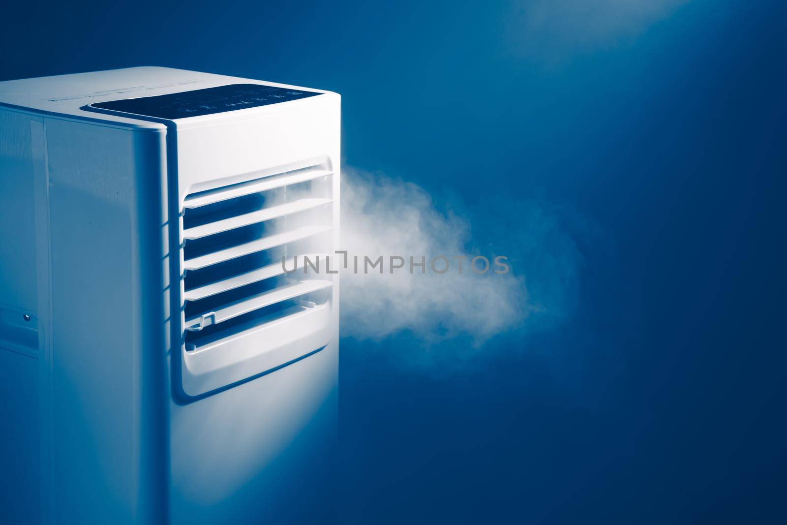 air condition louvers outlet with cold steam, close-up view by nikkytok