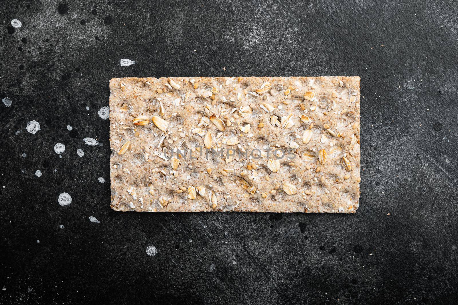 Crunchy crispbread Healthy snack set, on black dark stone table background, top view flat lay