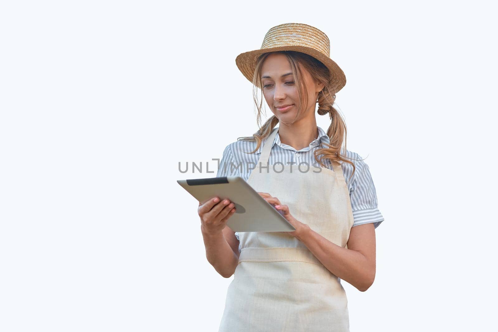 Woman dressed apron with digital tablet white background Caucasian middle age female business owner in uniform by andreonegin