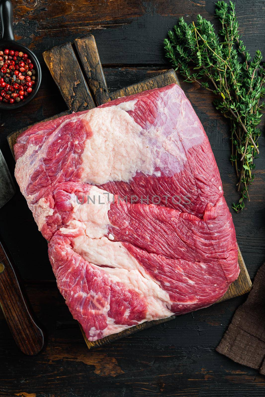 Point brisket, raw beef brisket meat,with ingredients for smoking making barbecue, pastrami, cure, on old dark wooden table background, top view flat lay by Ilianesolenyi