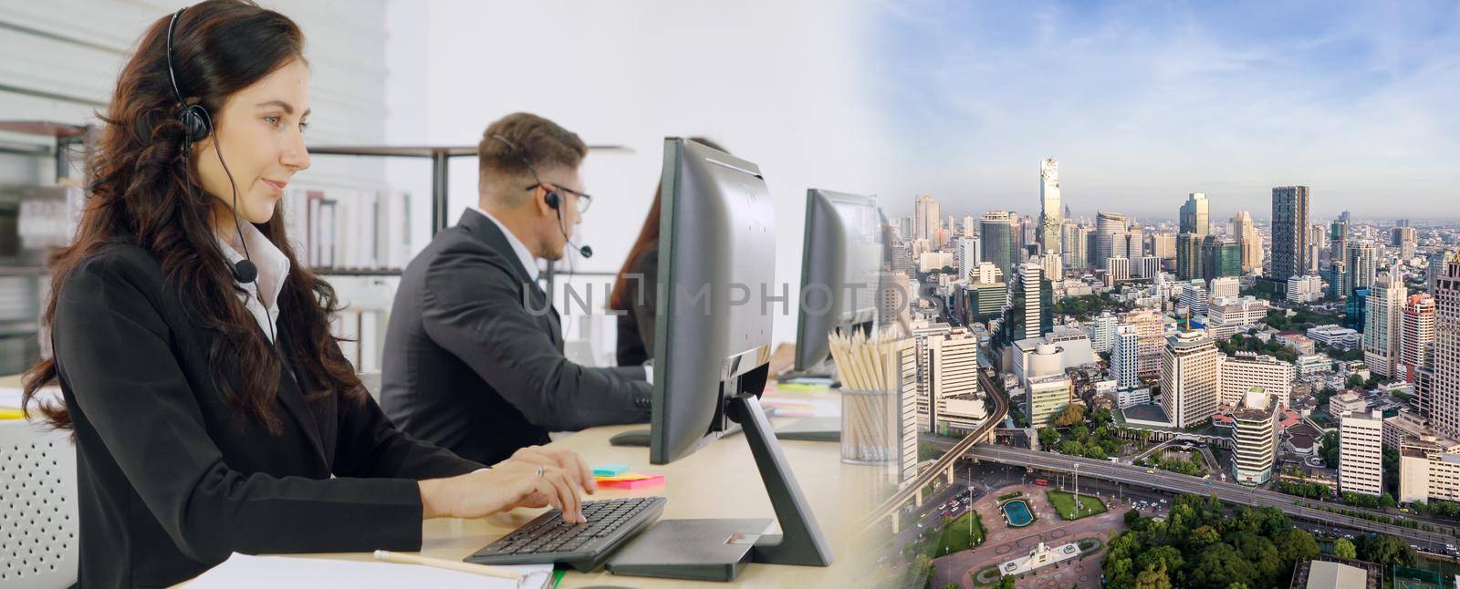 Business people wearing headset working in office broaden view by biancoblue