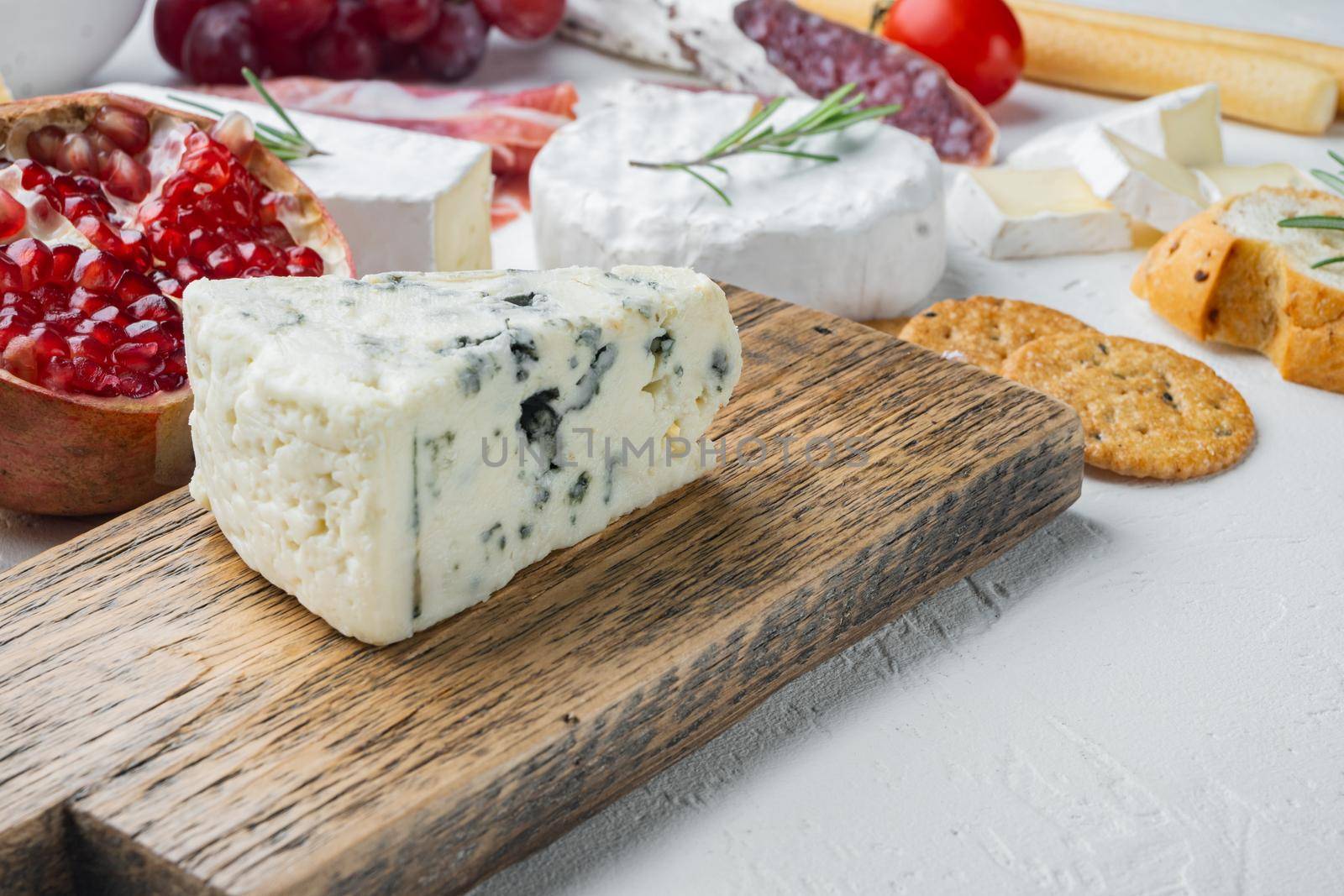 Piece of gorgonzola cheese set, on white background