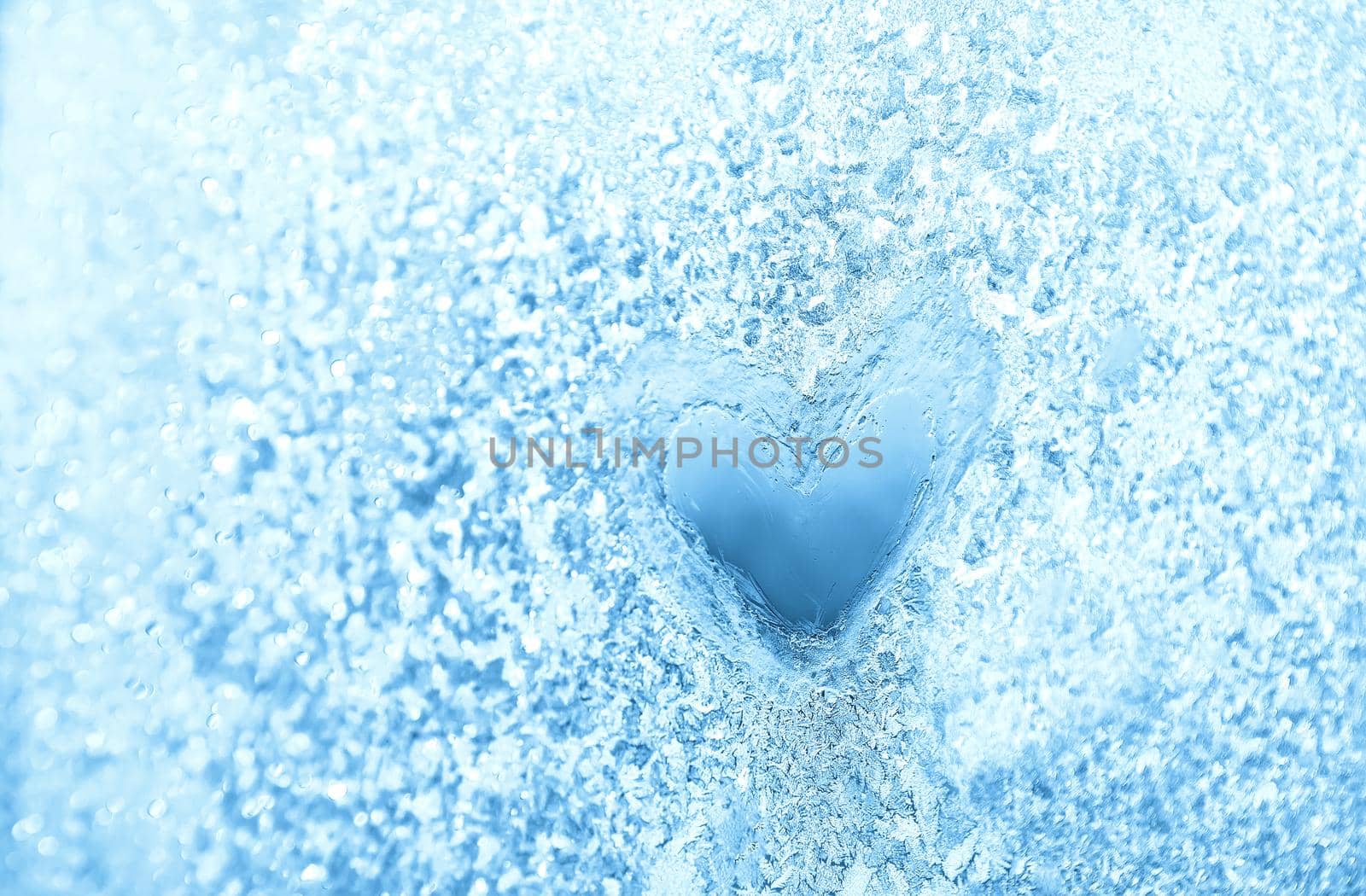 Frost patterns on the window. Texture. Selective focus. by yanadjana