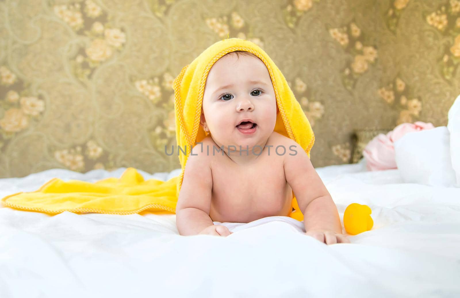Baby after bathing in a towel. Selective focus. Child.