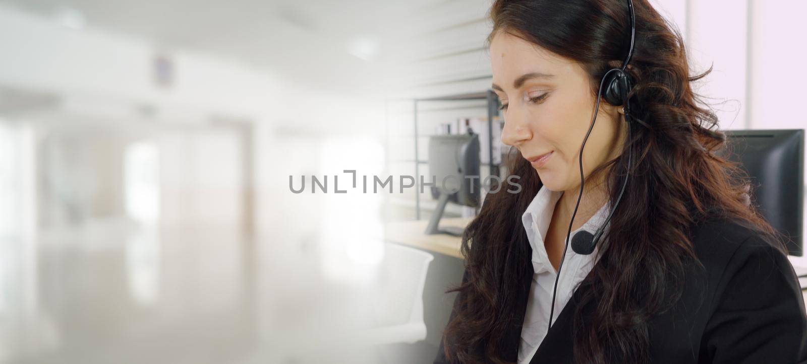 Business people wearing headset working in office to support remote customer or colleague. Call center, telemarketing, customer support agent provide service in broaden view .