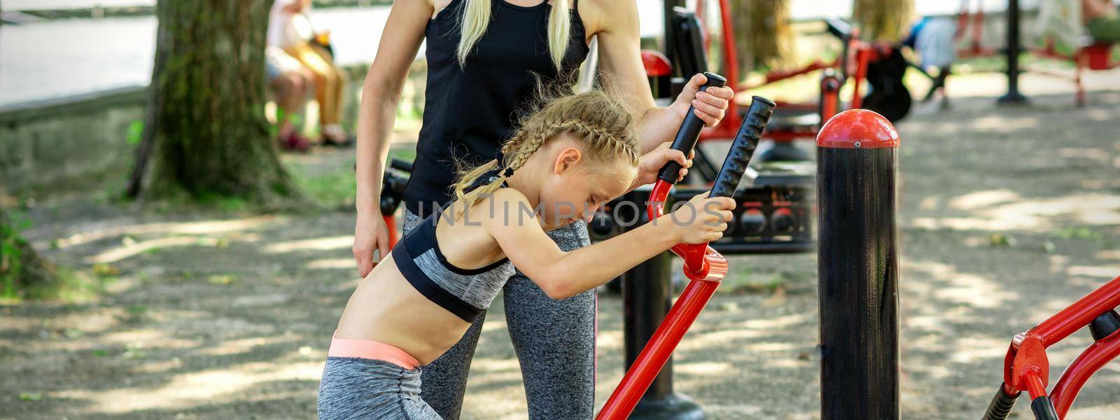 Little girl does exercises on simulator by okskukuruza