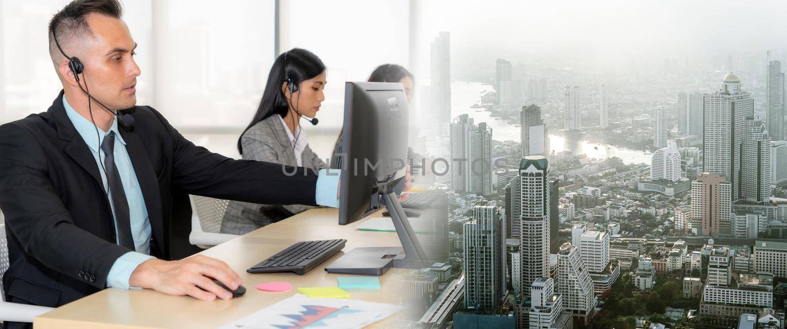 Business people wearing headset working in office broaden view by biancoblue