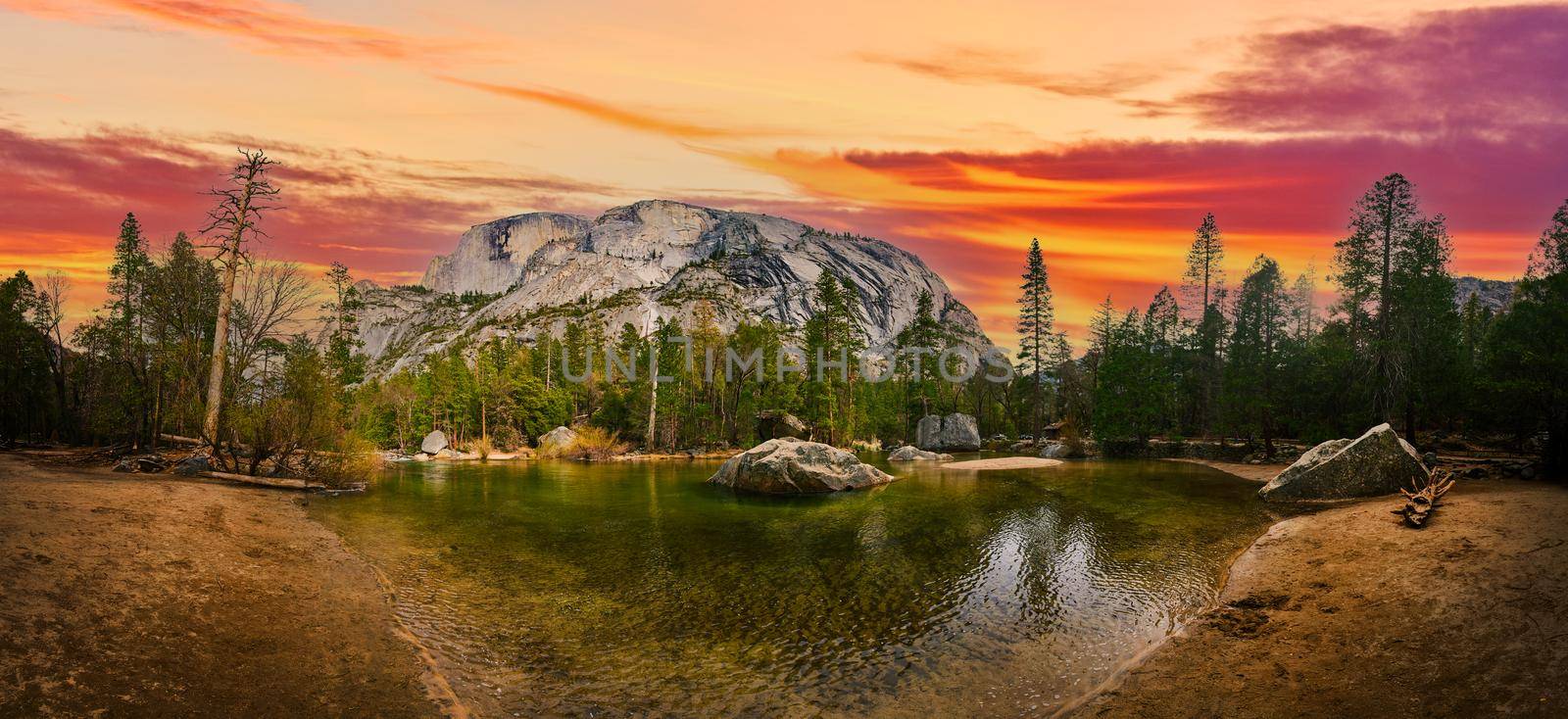 Panorama of iconic Yosemite Half Dome from Mirror Lake at dawn by njproductions