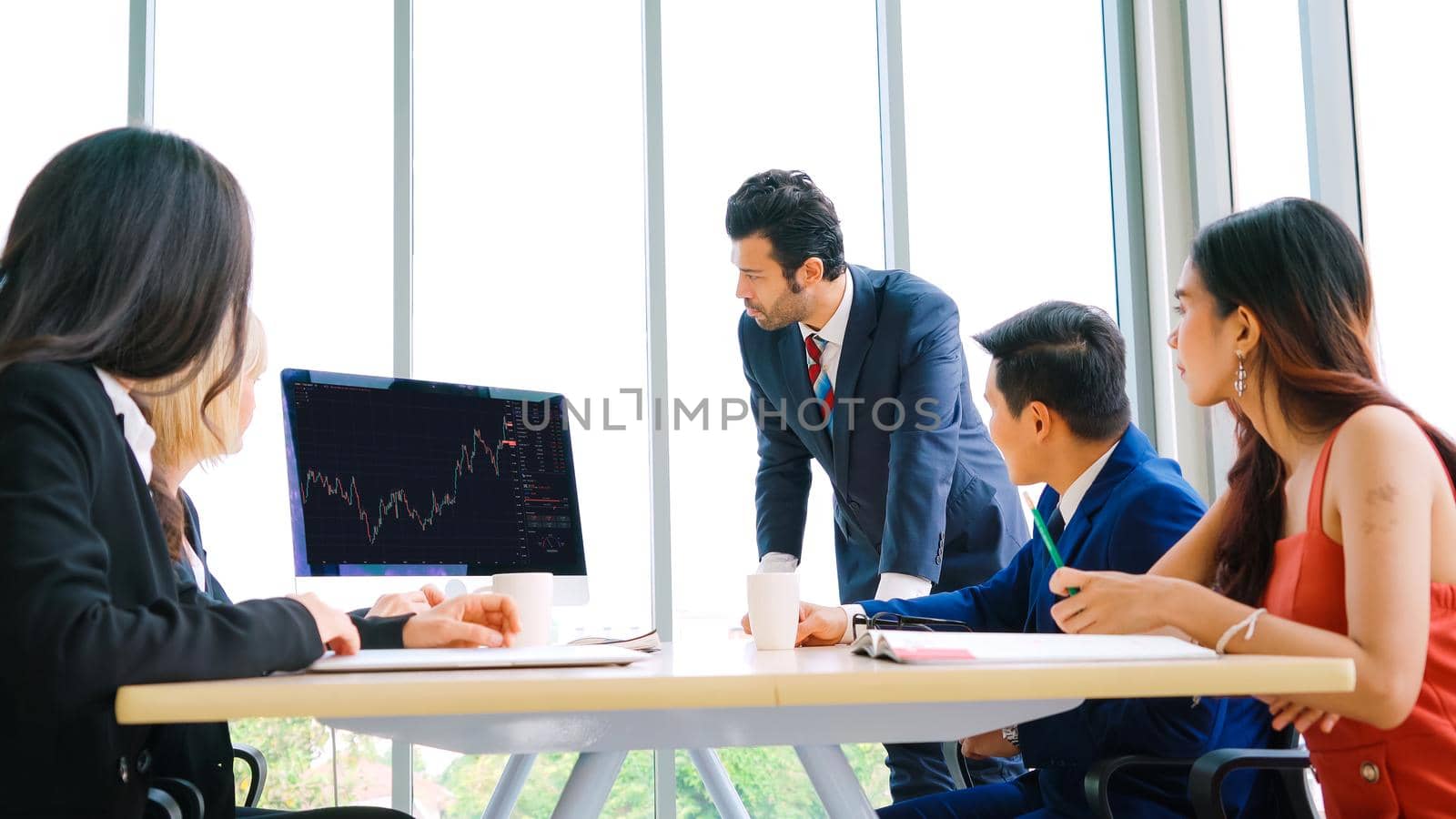 Stock market data chart analysis by ingenious computer software . Investment application display stock market chart on the computer screen and advise trading decision .