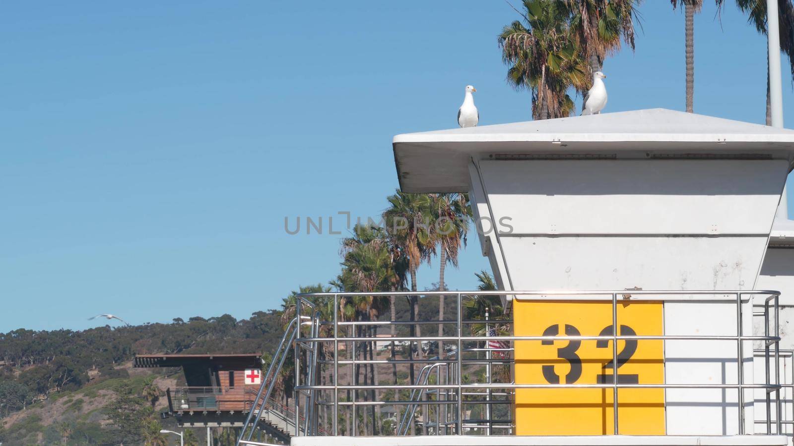 Lifeguard stand or life guard tower hut, surfing safety on California beach, USA by DogoraSun