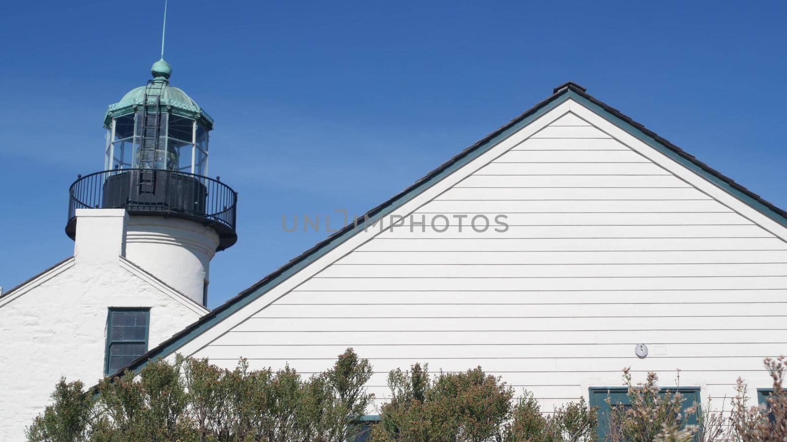 Vintage lighthouse tower, retro light house, old fashioned classic white beacon. by DogoraSun