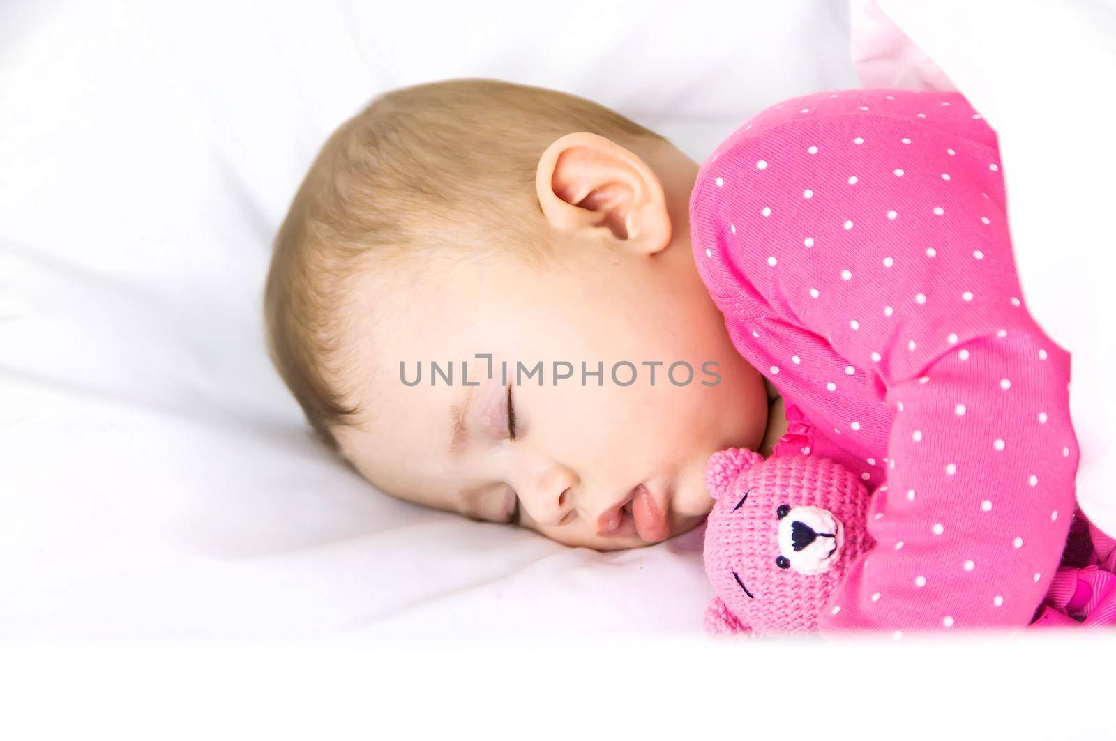 Baby baby sleeps in the crib. Selective focus. Child.