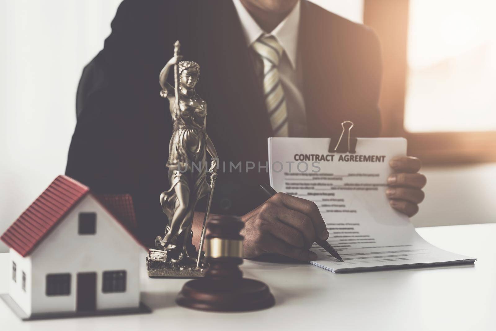 Close up lawyer businessman working or checking contract in office workplace for consultant lawyer concept