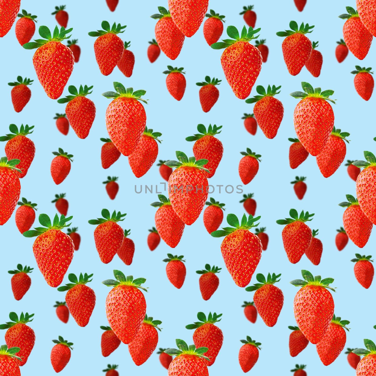 Fresh strawberry seamless pattern. Ripe strawberries isolated on blue. Package design background. Falling strawberry selective focus.