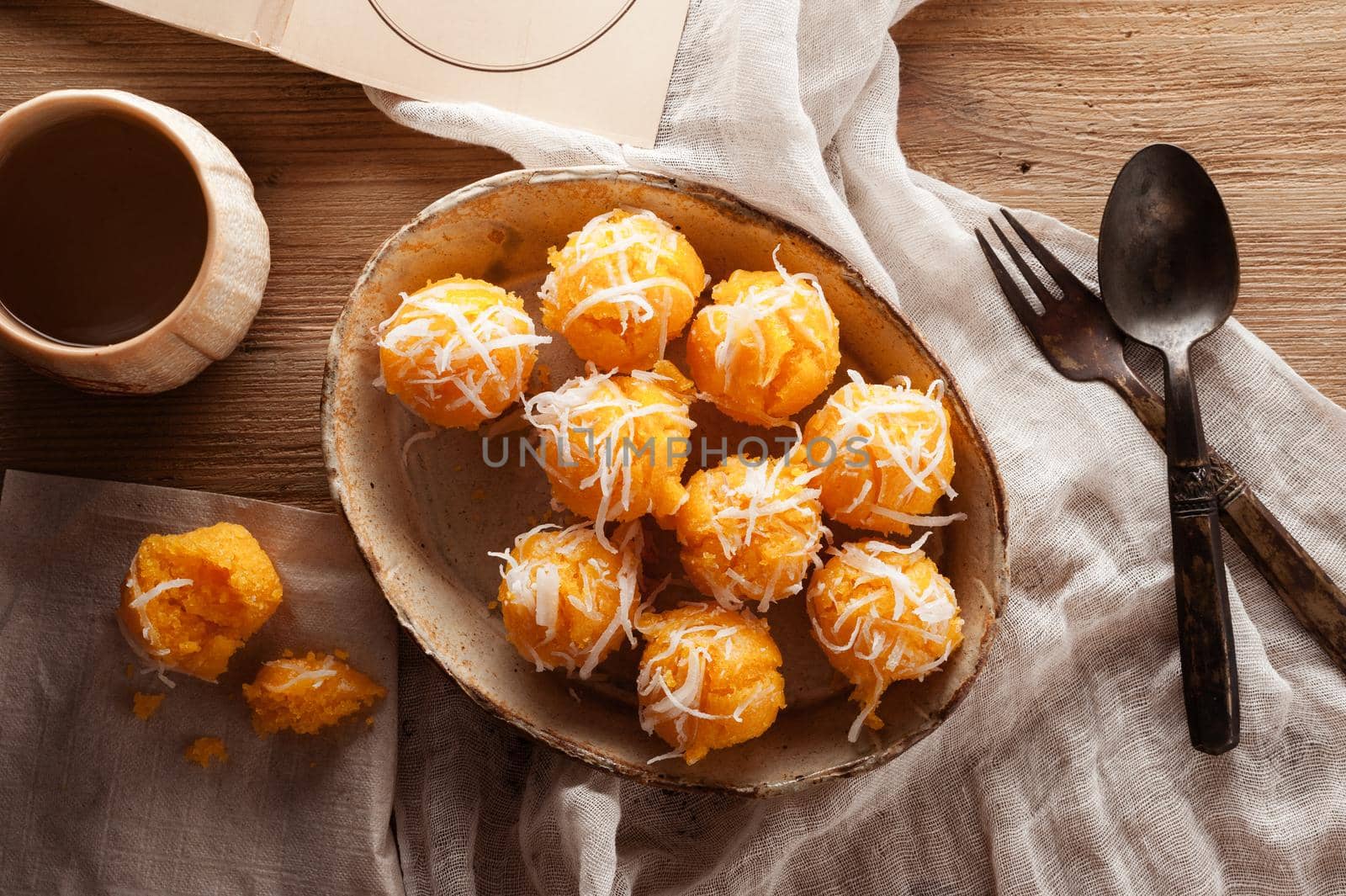 Toddy palm cake or Kanom Tan, Thai traditional dessert. Khanom tan is made from rice flour, ripe sugar palm fruit, coconut milk, scraped coconut, sugar and salt.