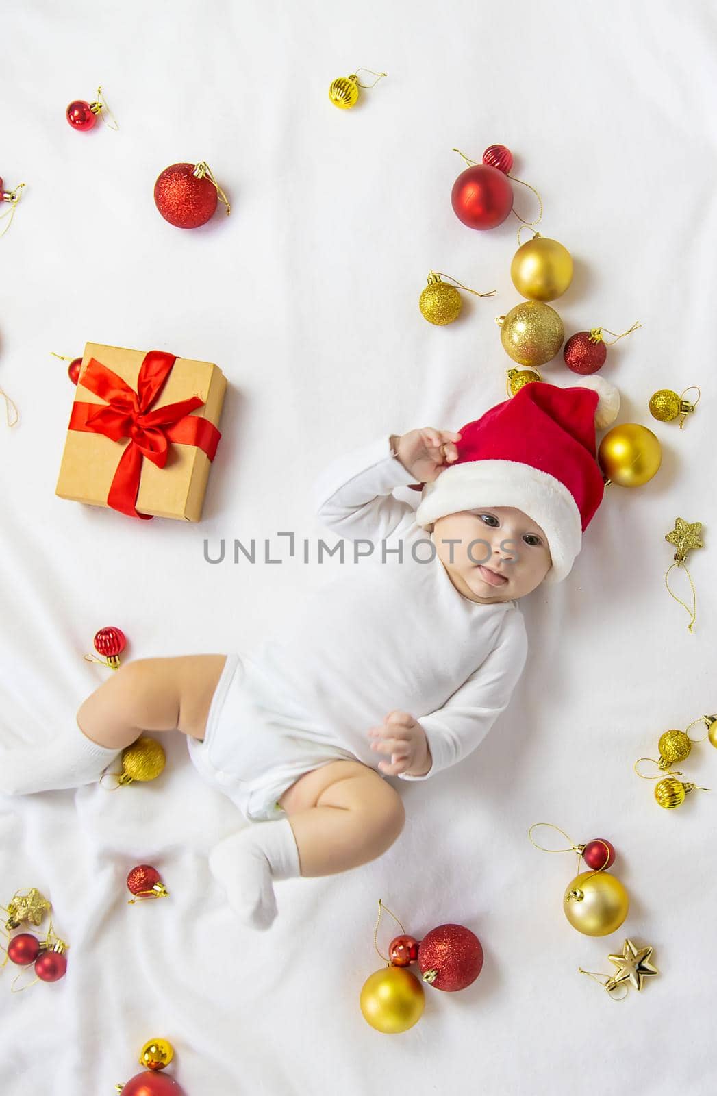 Christmas photo of baby with New Year's decor. selective focus. holiday.